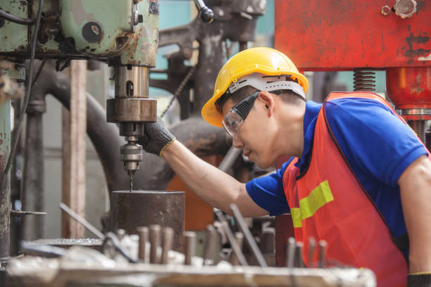 istock Asian Industrial workers. worker Asian in factory on the machine 1300259613