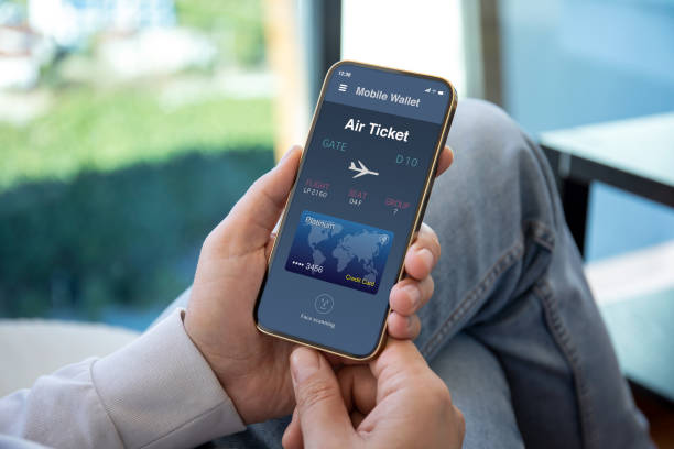 istock male hands holding phone with airplane ticket application airlines screen 1300263170