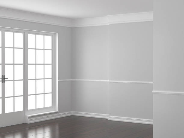 istock Empty living room design. Light walls and ceiling and dark floor 1300263214