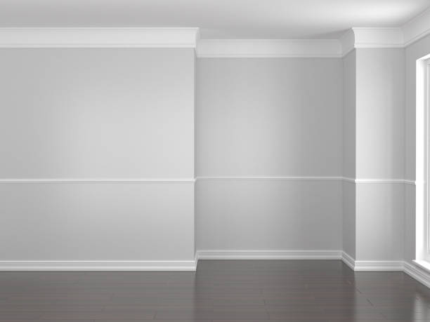 istock Empty room with gray walls and dark floor 1300263235