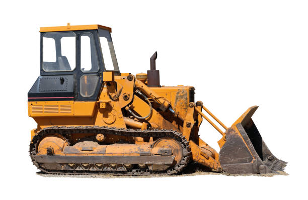 Old abandoned yellow bulldozer. Old rusty and weathered bulldozer on white background