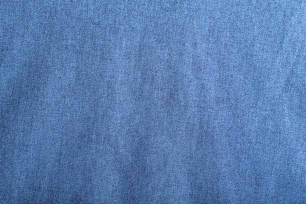 istock Blue denim seamless fabric. Cotton fabric texture 1300267619