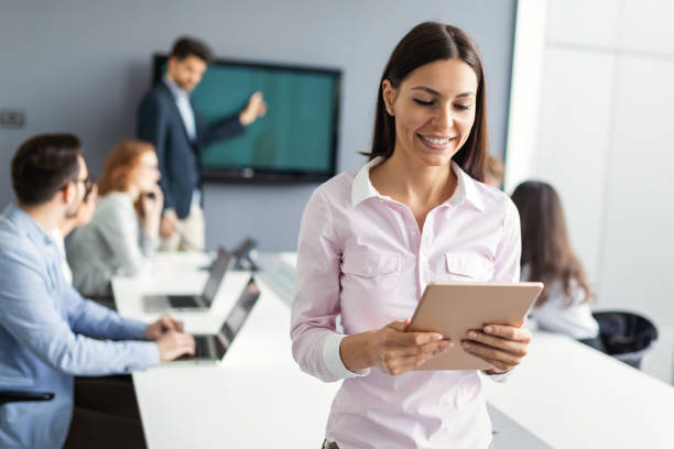 istock Business people having board meeting in modern office 1300267760