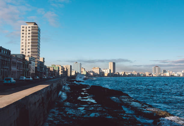 istock City Buildings By Sea Against Sky 1300268996