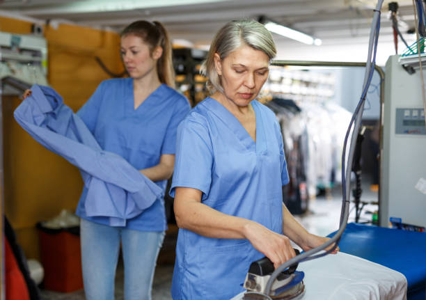 istock In process of ironing clean clothes 1300271533