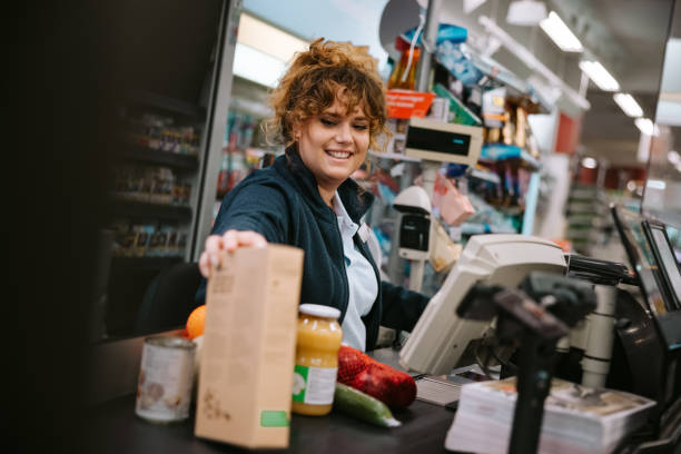 istock Woman working in modern supermarket 1300276380