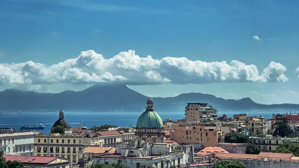 Photo of Napoli, panoramic view of the Basilica di Santa Maria degli Angeli a Pizzofalcone. Costiera sorrentina on background.