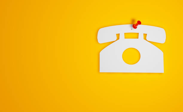 istock Pin Paper Phone Symbol on Yellow Background 1300279399