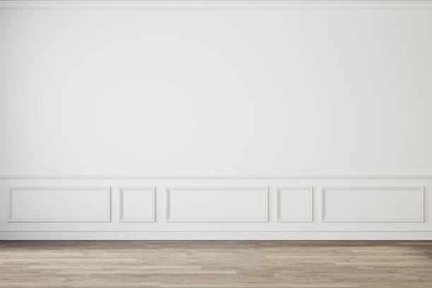 istock Modern classic white empty interior with wall panels molding and wooden floor. 1300280121