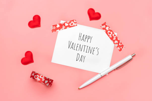 istock Romantic decoration on pink background Top view Flat lay 1300280892