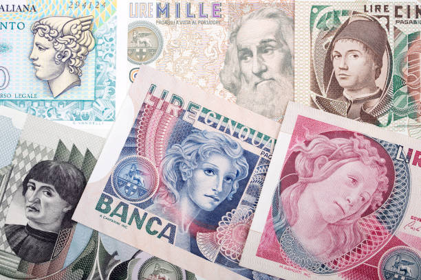 istock Old Italian money - Lira a background 1300281867