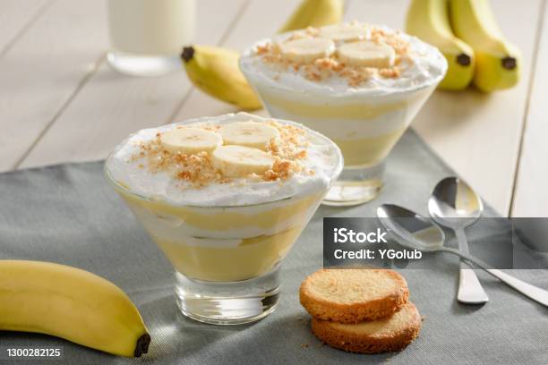 Delicious Dessert With Banana Slices And Cookie Crumbs Stock Photo - Download Image Now