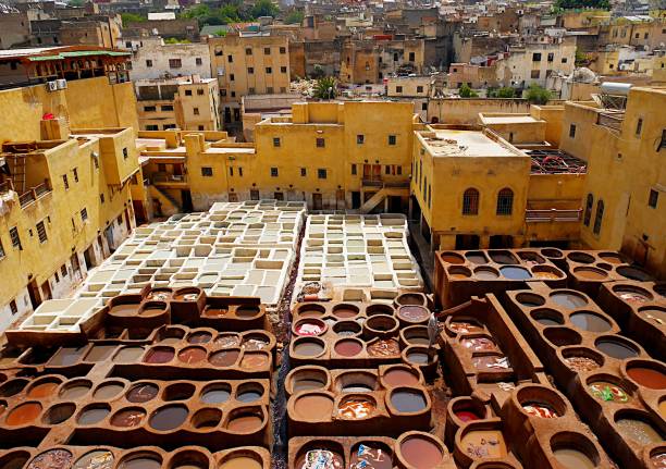 istock handmade leather Tannery with Fez, Morocco town overview 1300283482
