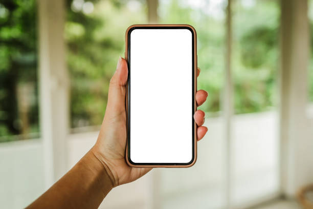 istock Women's hands holding cell telephone blank copy space screen. smart phone with technology concept 1300283897