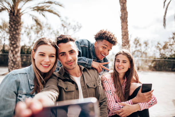 istock friends take a selfie in the city 1300284751