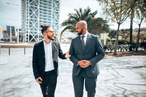 istock mixed business man giving the handshake in barcelona 1300285888