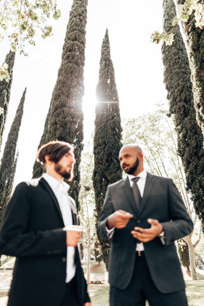 istock mixed business man giving the handshake in barcelona 1300285949