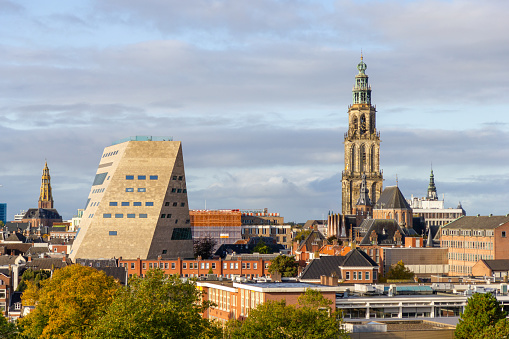 Groningen, the Netherlands - 18 Oct, 2020: Cityscape of Groningen with the three famous buildings in the sunny morning