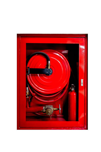 istock Red Fire extinguisher in office building Interior emergency safety equipment 1300286202