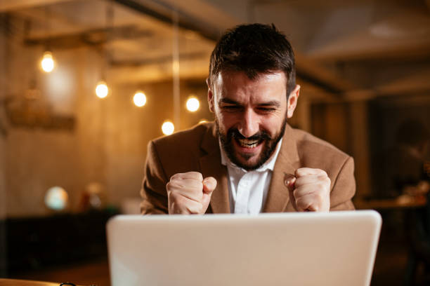 istock Young businessman working on laptop at office. 1300290646