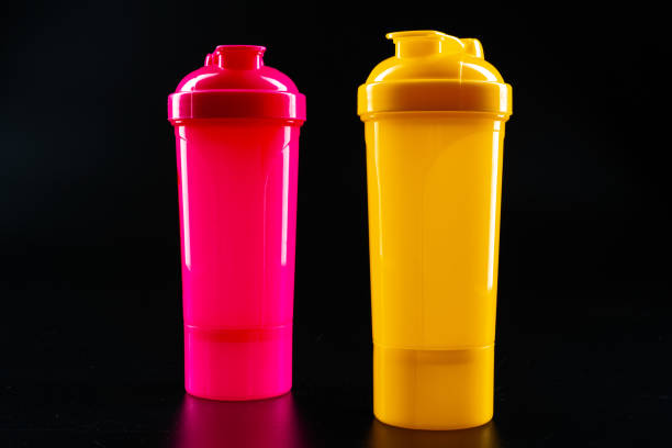 istock Sport bottle for drink on black background 1300293026