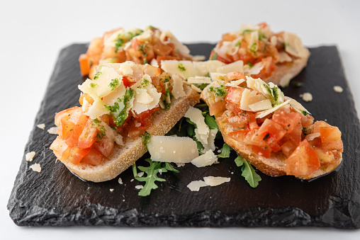Bruschetta with salsa and cheese close up