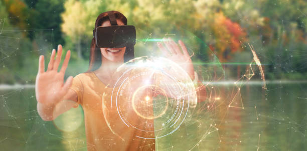 istock Composite image of happy young woman gesturing while using virtual reality glasses 1300296197