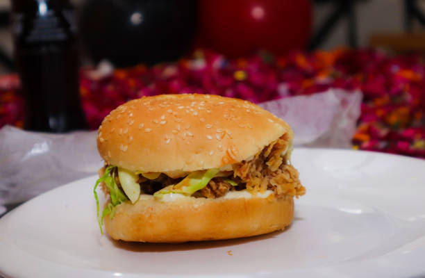 istock CRISPY CHEESY CHICKEN PATTY BURGER WITH FRIES 1300299638
