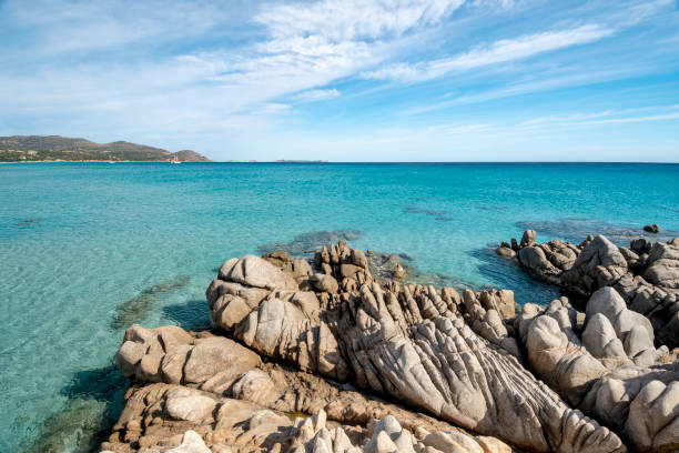 istock crystal clear water white sand at Notteri beach, Villasimius 1300300917