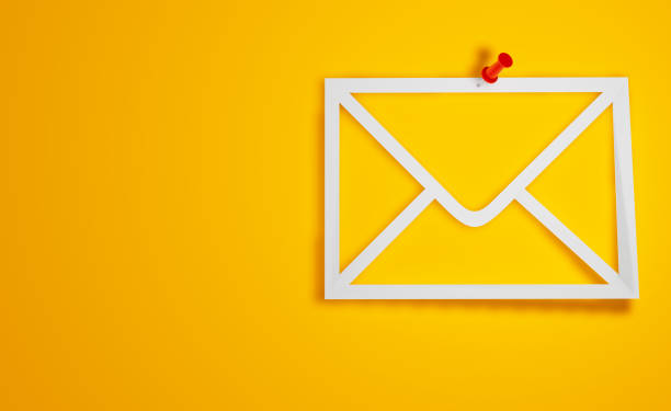 istock Pin Paper Envelope Symbol on Yellow Background 1300302763