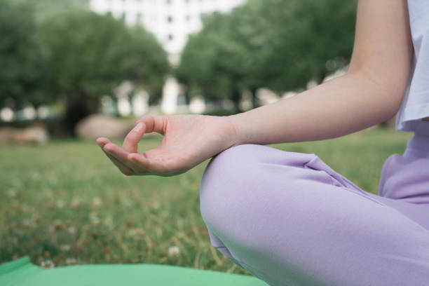 istock ttractive young woman doing yoga 1300303392