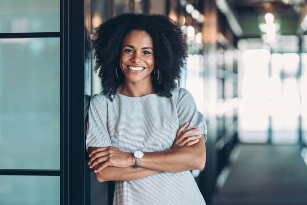 Beautiful smiling African ethnicity businesswoman Portrait of a smiling businesswoman black business woman stock pictures, royalty-free photos & images