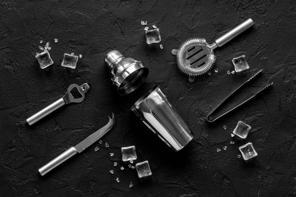 istock Cocktail bar utensils and tools with shaker, strainer and ice 1300305459