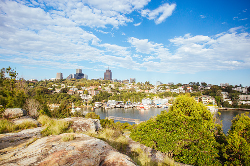 The Sydney CBD and surrounding harbour over Berrys Bay and old BP Australia refinery, on a clear summer day on February 8th 2015.