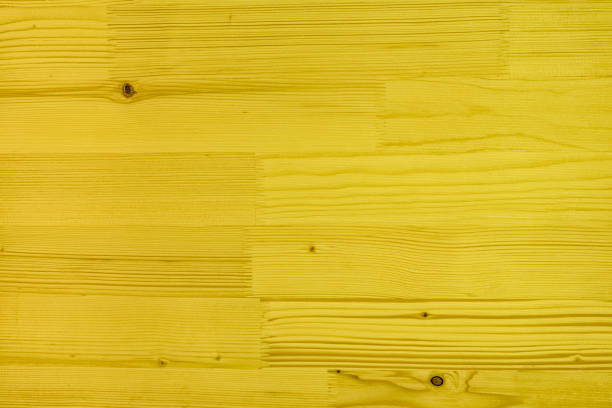 istock Wood surface with yellow color paint 1300309068