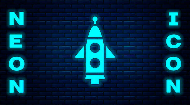 Glowing neon Rocket ship icon isolated on brick wall background. Space travel. Vector Glowing neon Rocket ship icon isolated on brick wall background. Space travel. Vector. traditional culture vector car engine stock illustrations