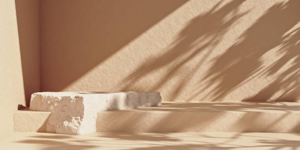 Photo of Stone product podium with sunshade shadow on the beige wall
