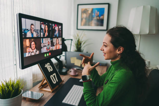 Business meeting on video call during COVID-19 lockdown Businesspeople discussing business on virtual staff meeting during pandemic conference call stock pictures, royalty-free photos & images