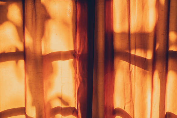 istock Blurred curtain on window of home 1300312275