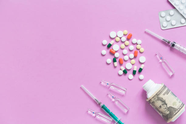 packaging with variegated pills, ampulla and expendable syringe for vaccination. treatment concept various infection and virus diseases. - expendable imagens e fotografias de stock