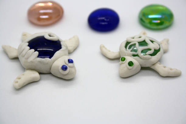 istock A turtle made of polymer clay on a white background. 1300315974