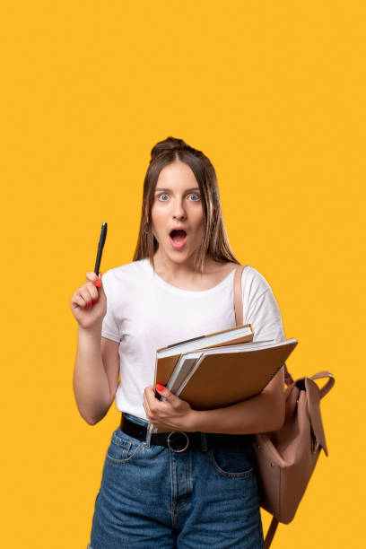 istock great idea student lifestyle shocked woman 1300323336