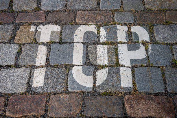 istock the word top with white color on cobblestone for backgrounds 1300325440
