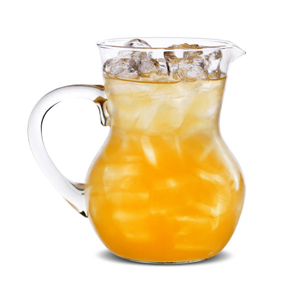 istock Pitcher with orange juice, isolated on white background 1300331502