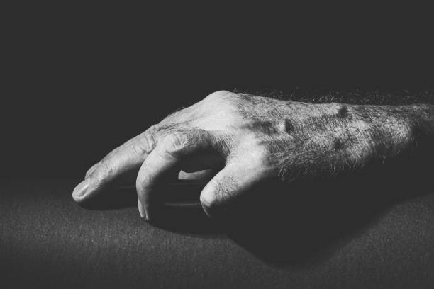 istock black white recording of a relaxed hand 1300332665