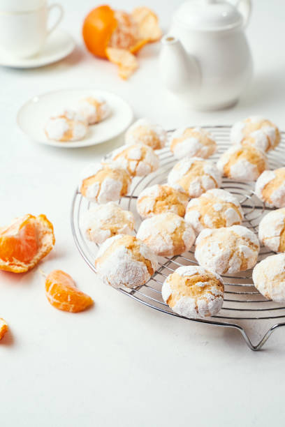 istock Home baked racked clementine cookies cooling on baking rack 1300333149