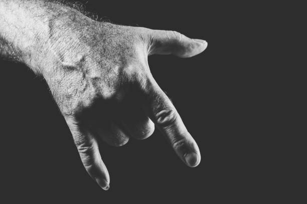 istock hand showing a cool gesture, in black and white 1300333576