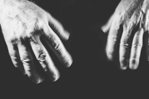 istock two fuzzy hands shaken, in black and white 1300334346