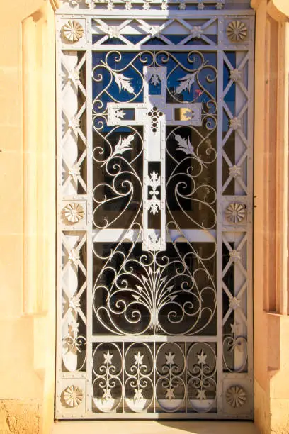 Photo of Wrought iron door in cemetery