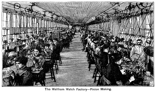 Women workers sitting at benches making pinions in the Waltham Watch Factory in Waltham, Massachusetts. Between 1850 and 1957 the American Waltham Watch Co produced around 40 million time-pieces and other instruments. From “The Cottager and Artisan, 1889” published by The Religious Tract Society, London.